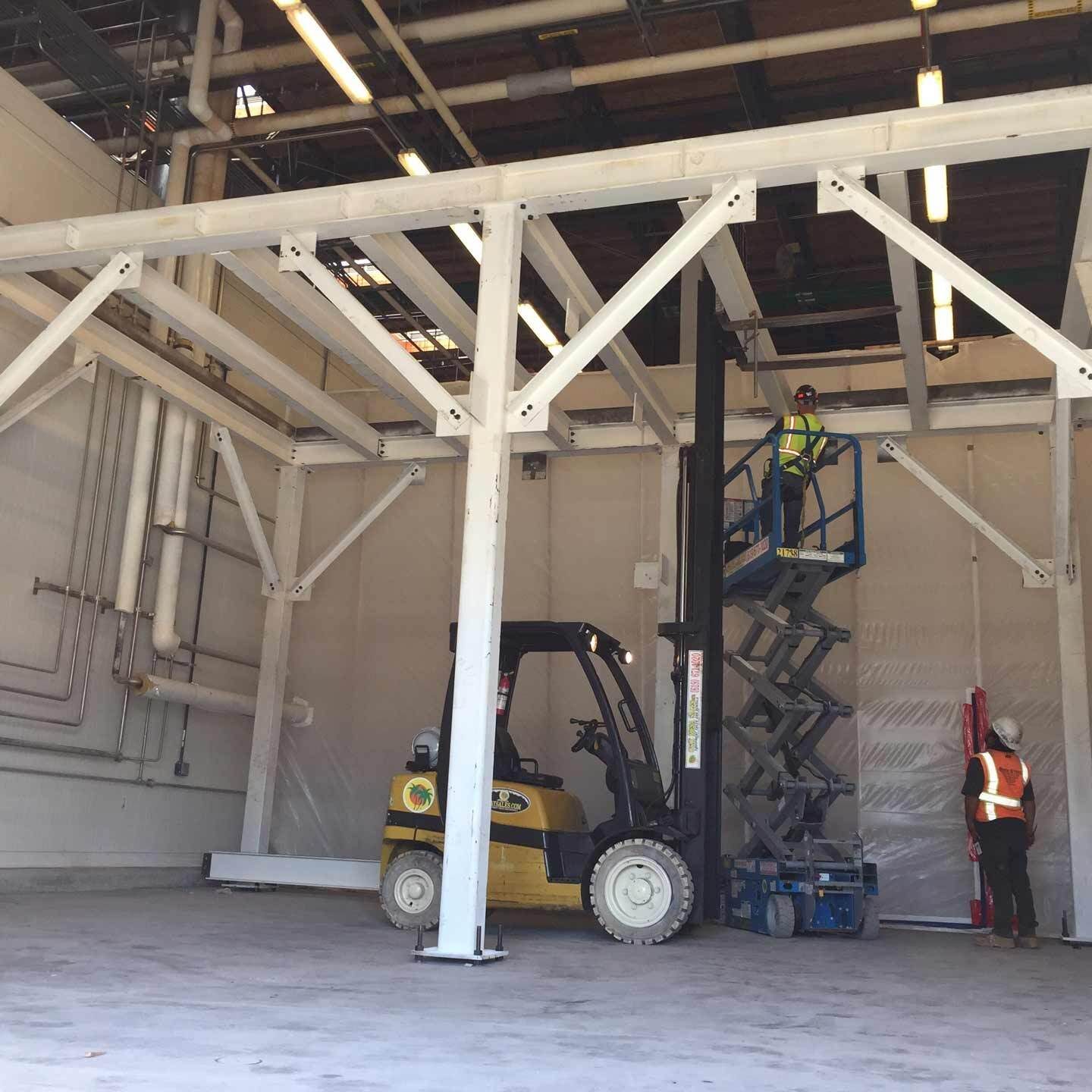 two contractors working on the roof